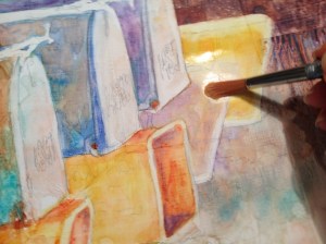 Using a stiff brush to scrub out the mailbox shape